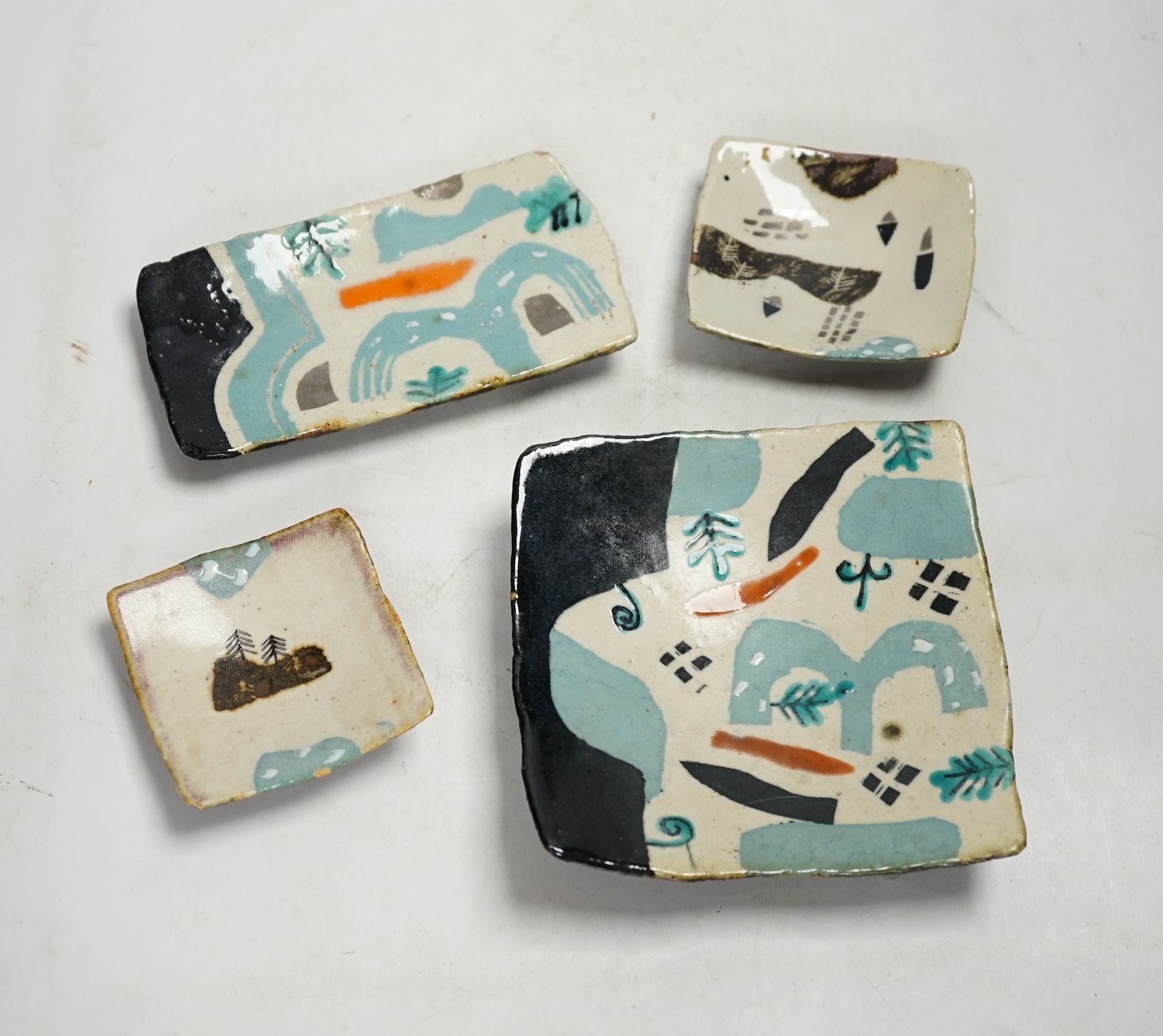 John Maltby (1936-2020), four studio pottery small rectangular dishes, largest 17cm long. Condition - fair